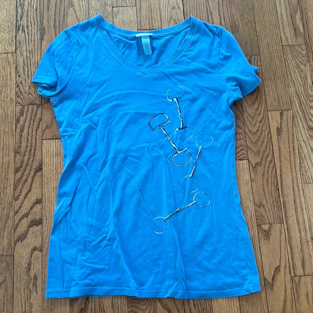Blue v-neck with snaffle bits on it size large